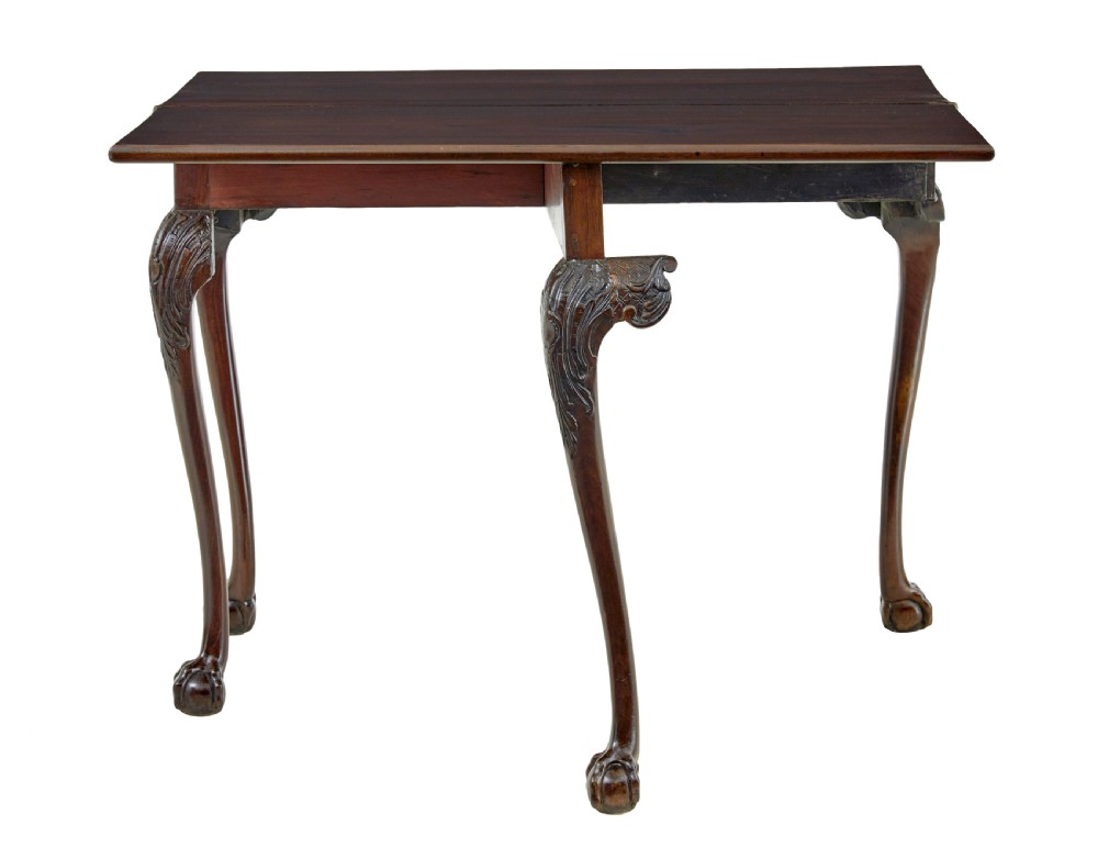 A 19th-century dark mahogany Chippendale Revival fold-over games table shown partially open, featuring carved cabriole legs and claw and ball feet. View II