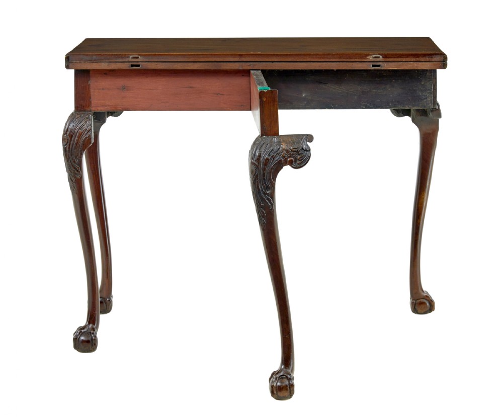 A 19th-century dark mahogany Chippendale Revival fold-over games table shown partially open, featuring carved cabriole legs and claw and ball feet. View III