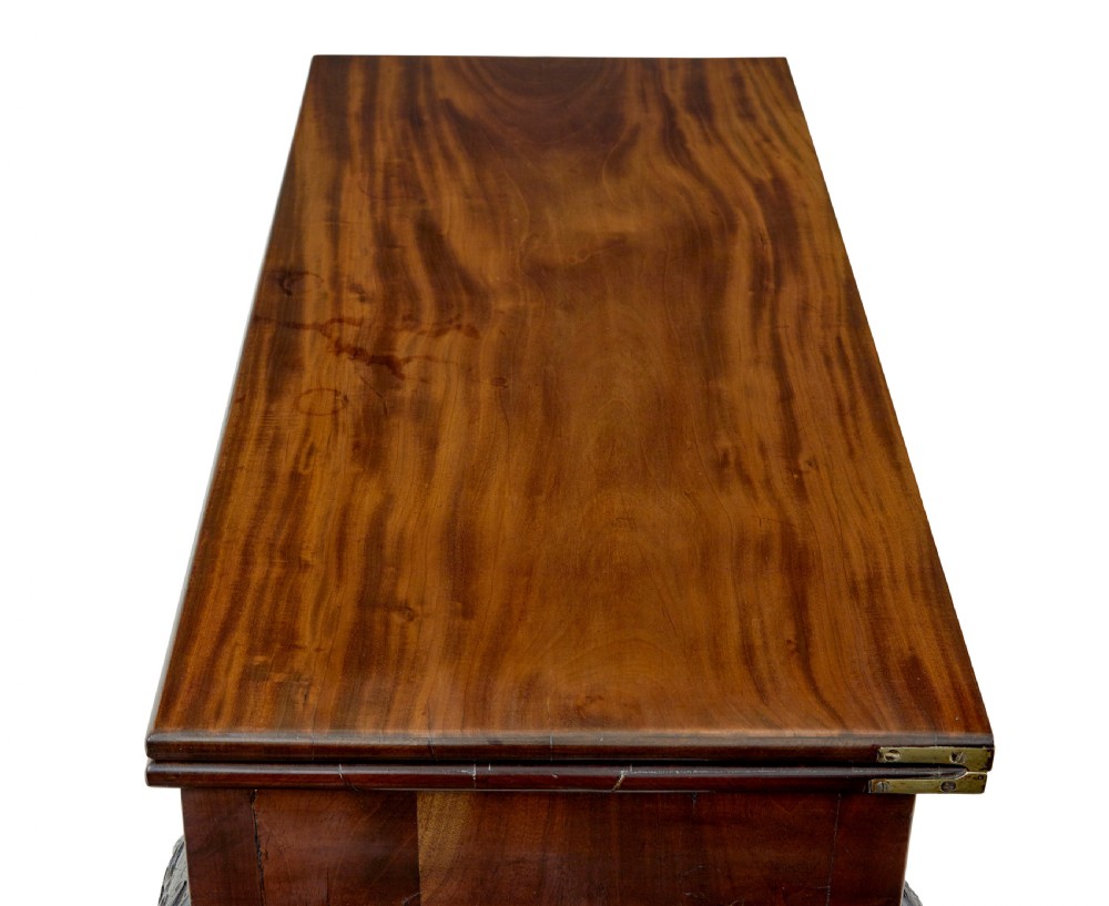 A 19th-century dark mahogany Chippendale Revival fold-over games table shown partially open, featuring carved cabriole legs and claw and ball feet. View VI