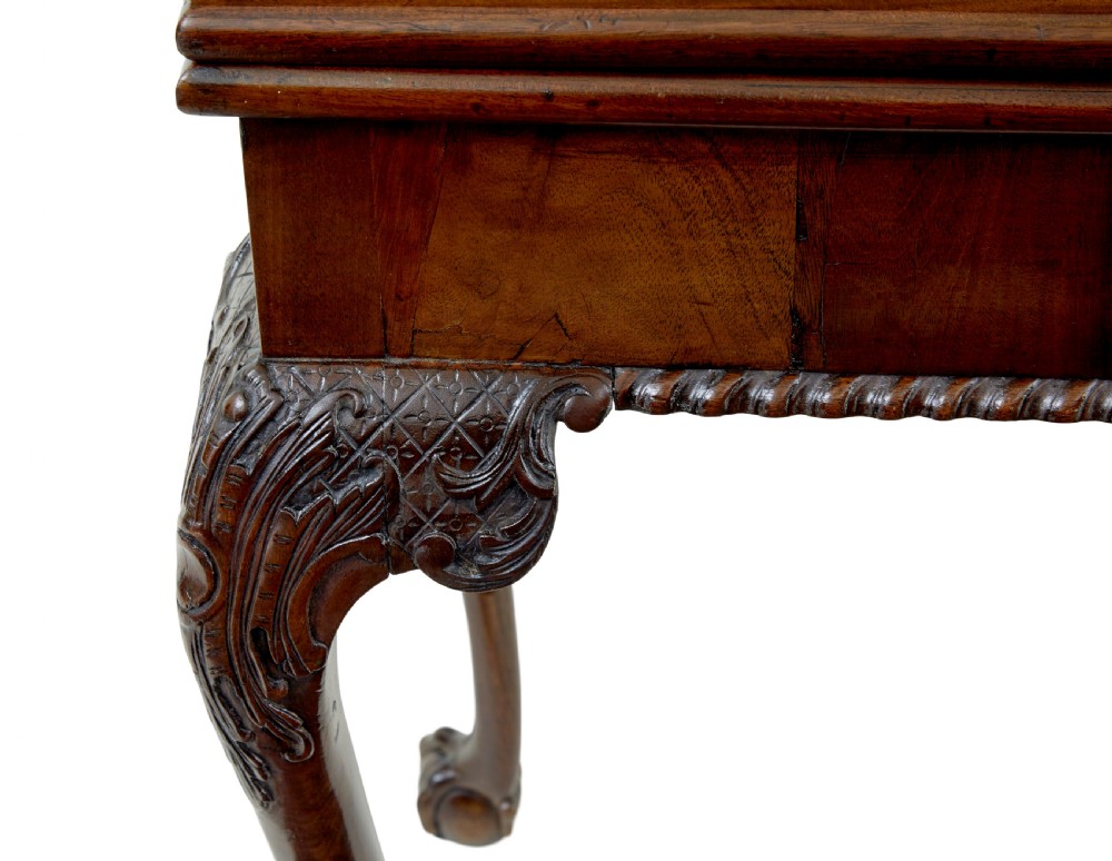 A 19th-century dark mahogany Chippendale Revival fold-over games table shown partially open, featuring carved cabriole legs and claw and ball feet. View VIII