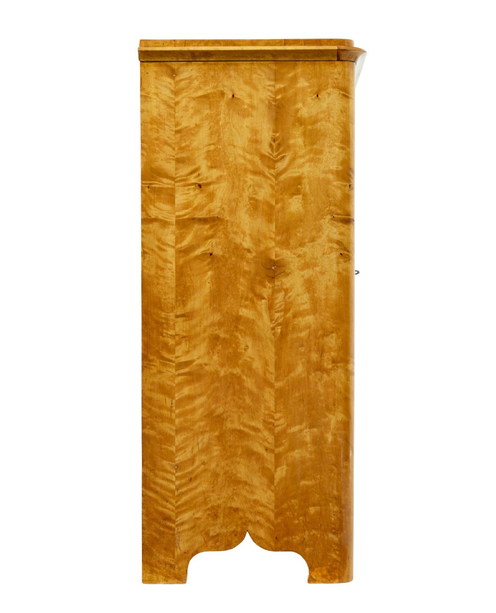 A nineteenth-century Swedish satin birch cupboard featuring two panelled doors with keyhole escutcheons and a shaped scalloped apron base. View VII