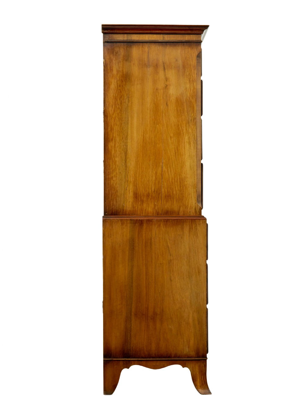 A two-section Late Georgian walnut chest on chest featuring figured timber veneers, brass drop handles, and bracket feet. View VII