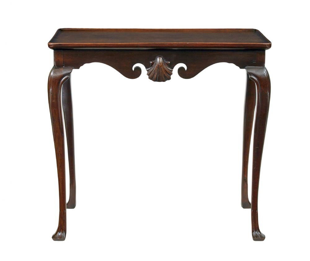 A dark mahogany Georgian-style silver table featuring cabriole legs with pad feet, a tray top edge, and a shell carved motif on the apron. View V