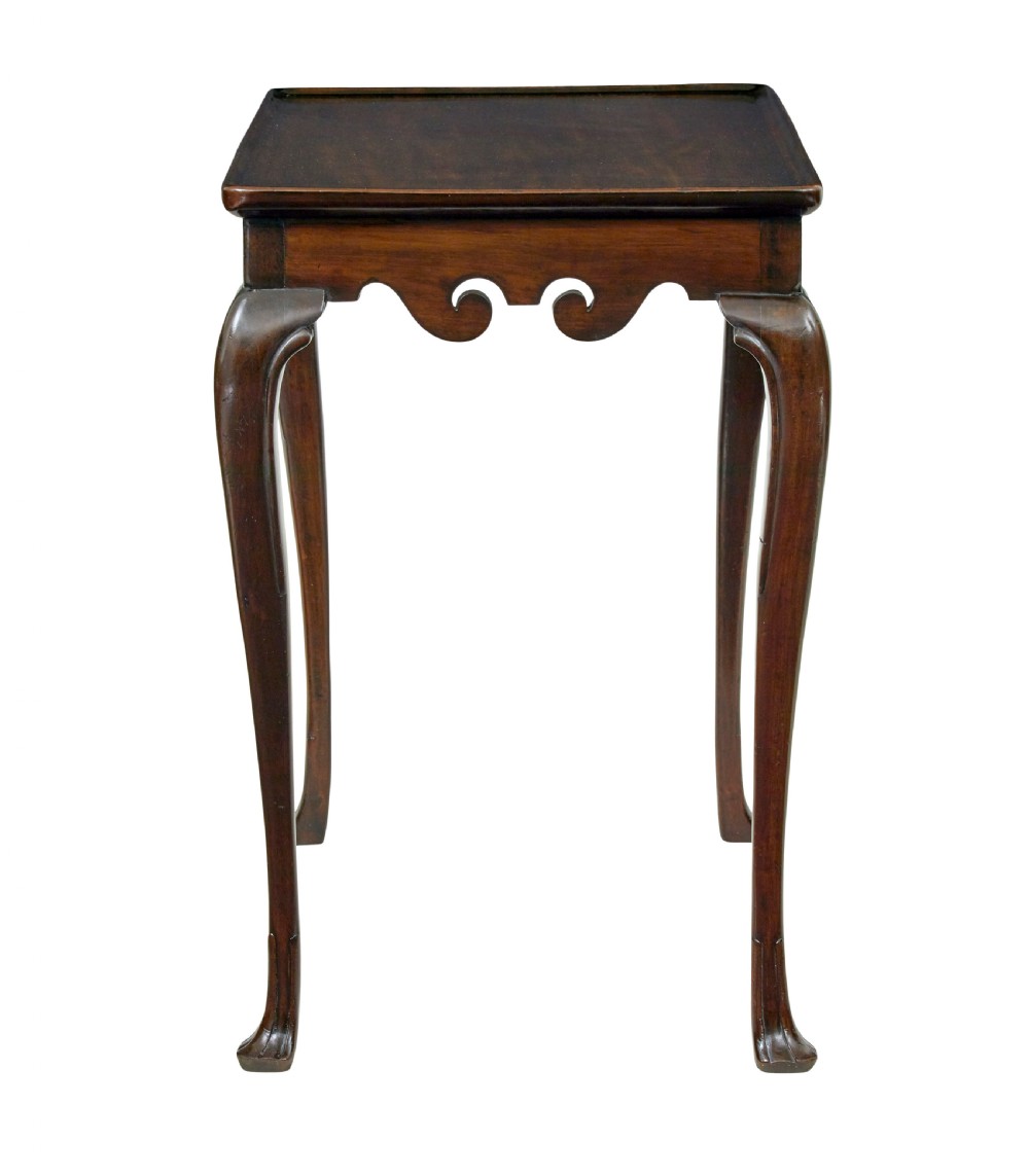 A dark mahogany Georgian-style silver table featuring cabriole legs with pad feet, a tray top edge, and a shell carved motif on the apron. View VII