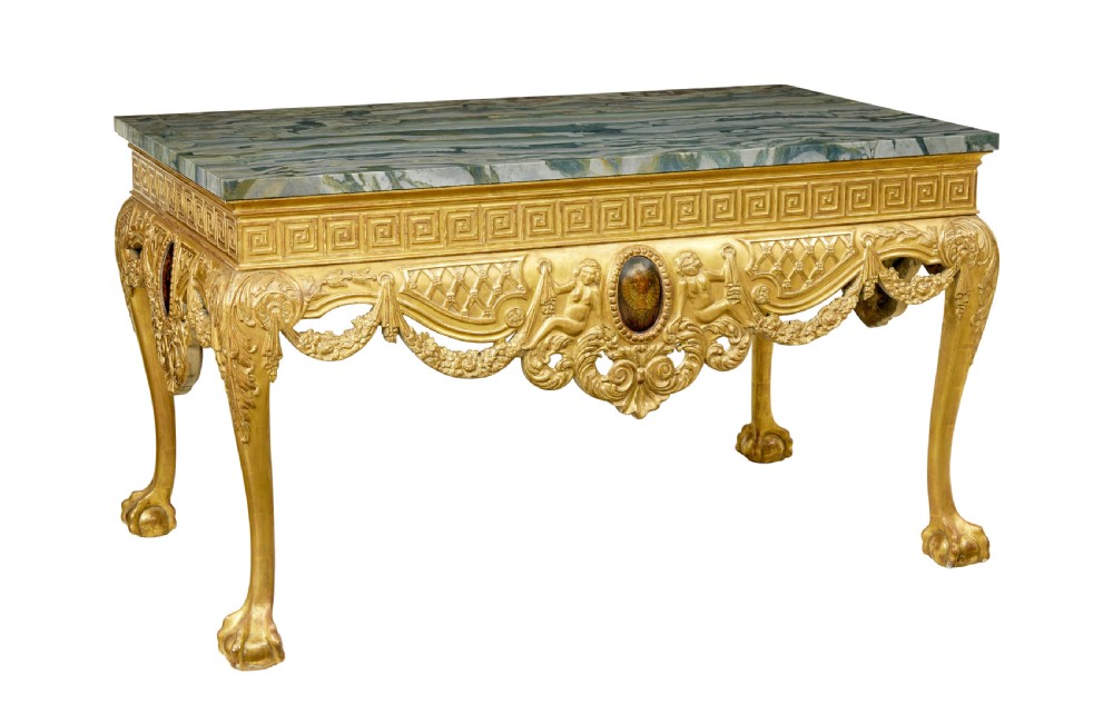 A 19th-century George II style giltwood centre table featuring a green marble top, Greek key frieze, carved swags, and cabriole legs ending in ball and claw feet.