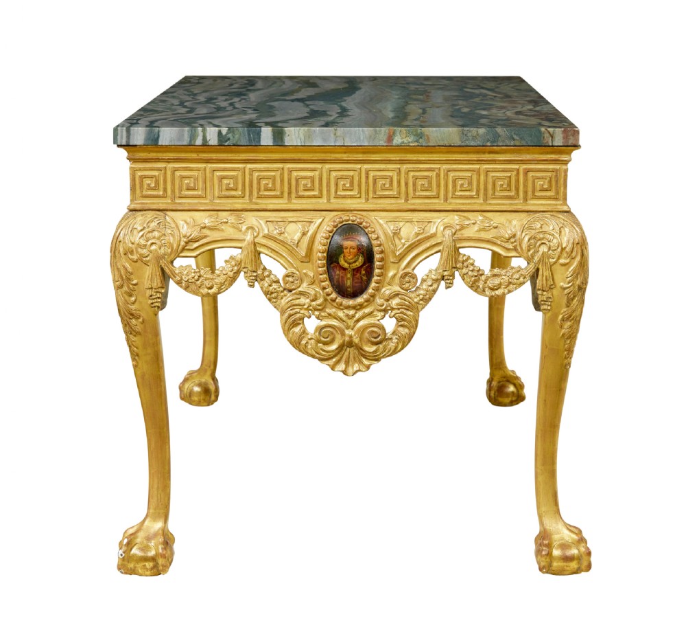 A 19th-century George II style giltwood centre table featuring a green marble top, Greek key frieze, carved swags, and cabriole legs ending in ball and claw feet. View V