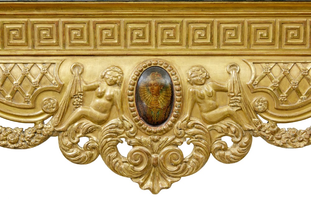 A 19th-century George II style giltwood centre table featuring a green marble top, Greek key frieze, carved swags, and cabriole legs ending in ball and claw feet. View XIII