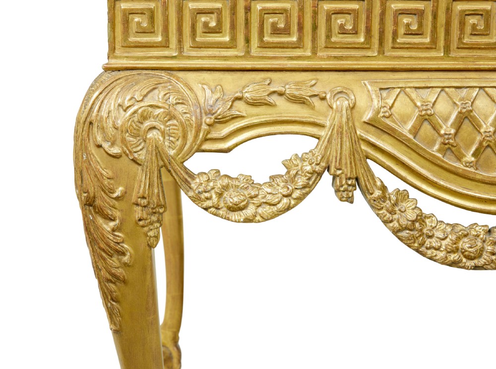 A 19th-century George II style giltwood centre table featuring a green marble top, Greek key frieze, carved swags, and cabriole legs ending in ball and claw feet. View XIV