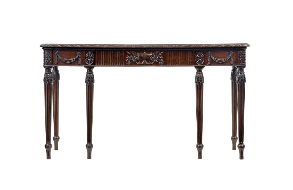 A 19th-century dark mahogany console table featuring a carved central urn, drapery swags, and six slender fluted legs. View III