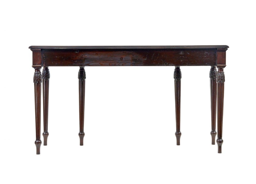 A 19th-century dark mahogany console table featuring a carved central urn, drapery swags, and six slender fluted legs. View V