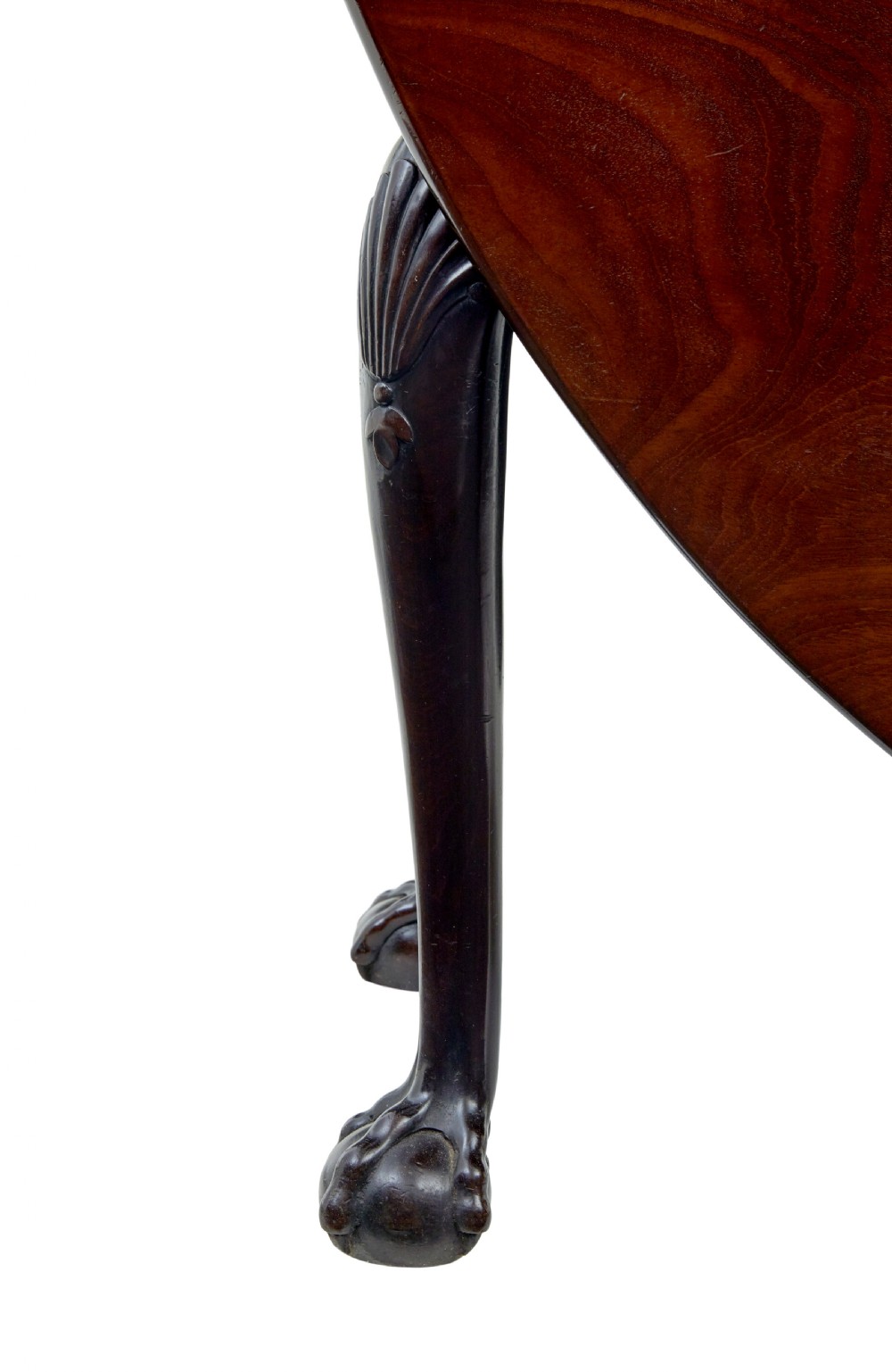 An eighteenth-century dark mahogany oval drop-leaf dining table featuring cabriole legs with carved knees and claw-and-ball feet. View VIII
