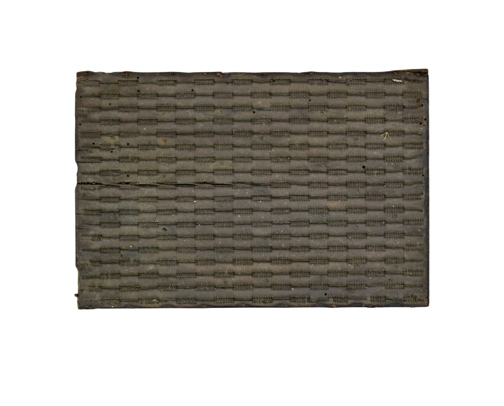 A collection of ten square and rectangular hand-carved wooden textile printing blocks featuring intricate brass wire and pin patterns. View XI