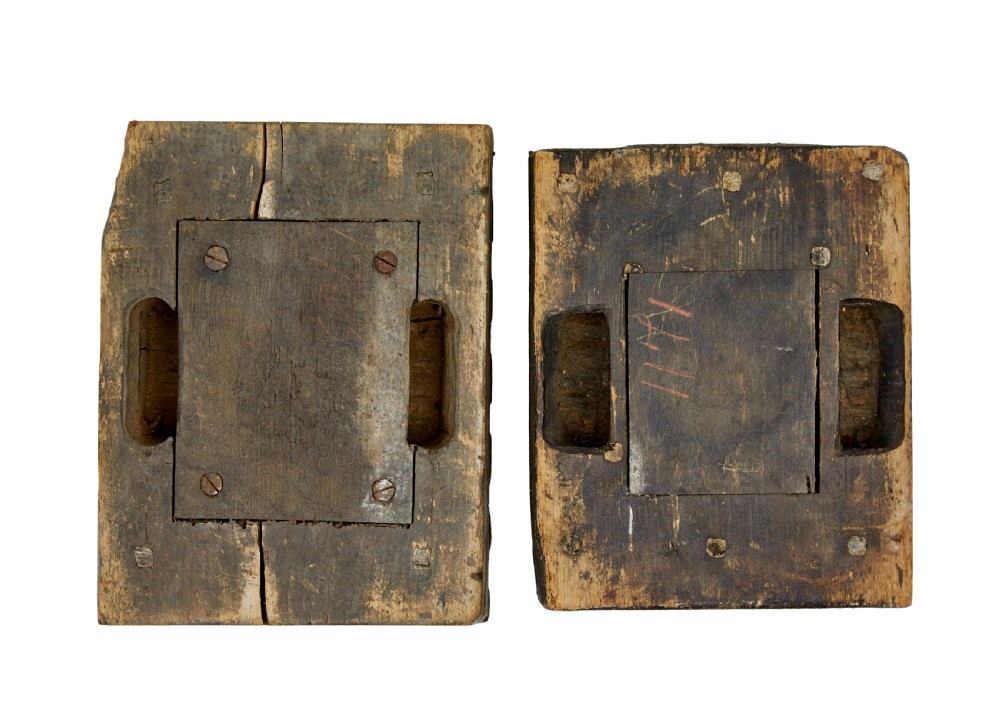 A collection of ten square and rectangular hand-carved wooden textile printing blocks featuring intricate brass wire and pin patterns. View XVI