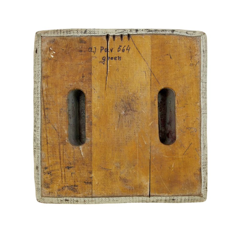 A collection of ten square and rectangular hand-carved wooden textile printing blocks featuring intricate brass wire and pin patterns. View XVII