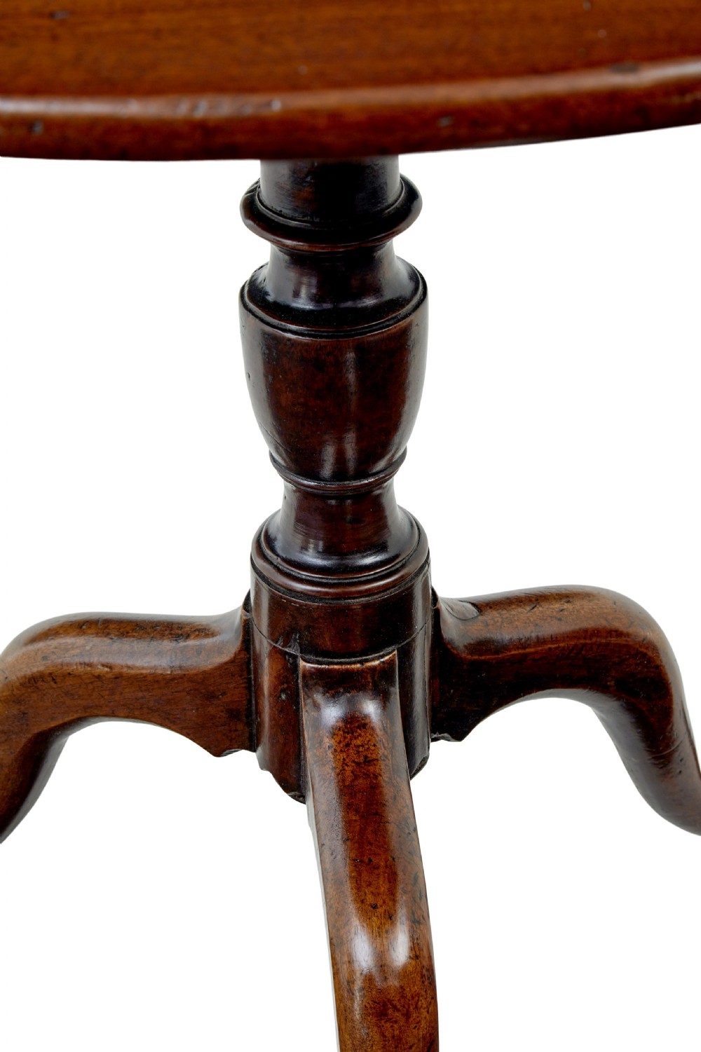 A circular dark mahogany Georgian tripod table featuring a turned central column and three cabriole legs with pad feet. View VII