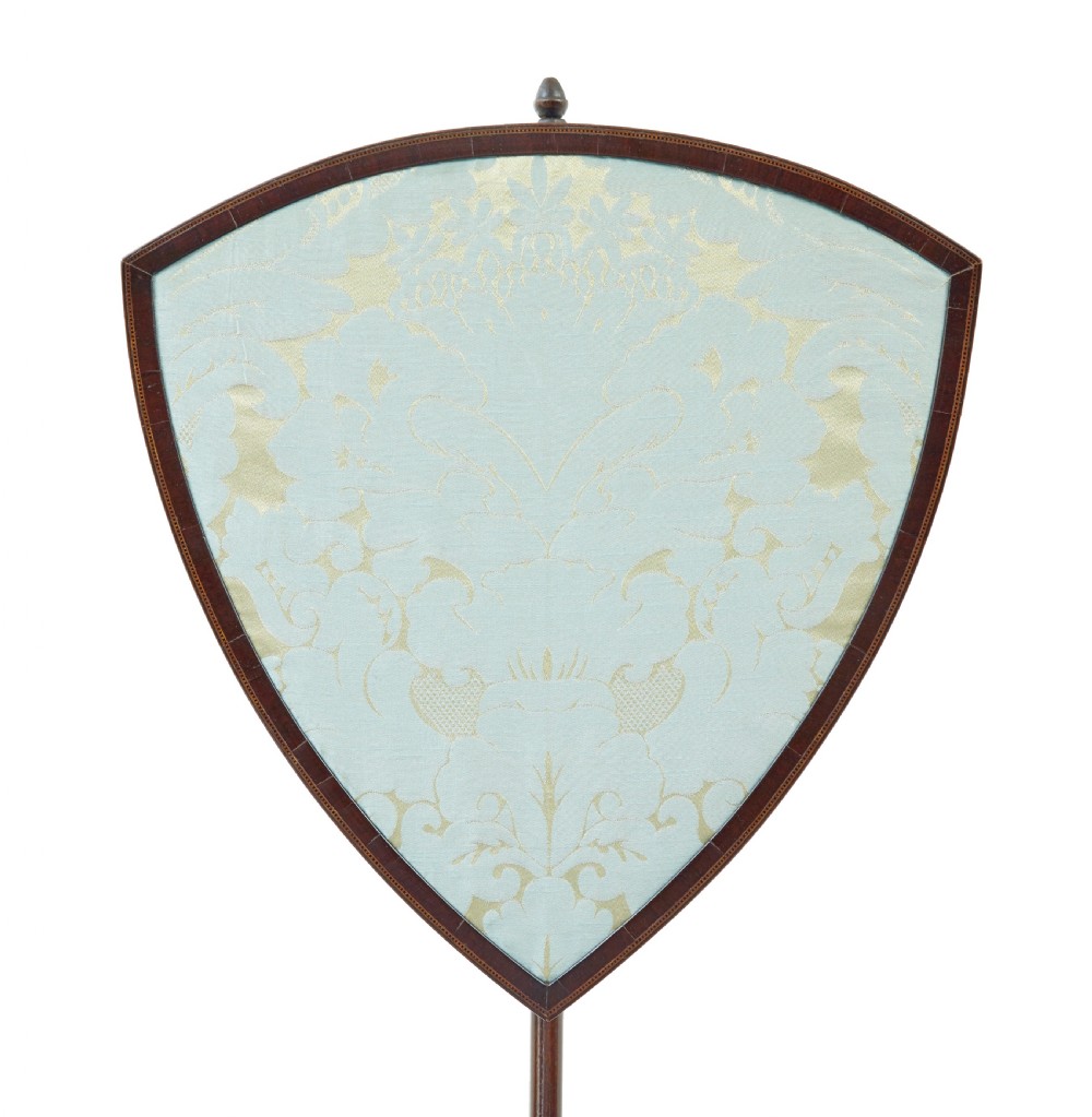 A 19th-century mahogany tripod pole screen featuring an adjustable shield-shaped light blue damask silk panel and an inlaid pedestal base. View V