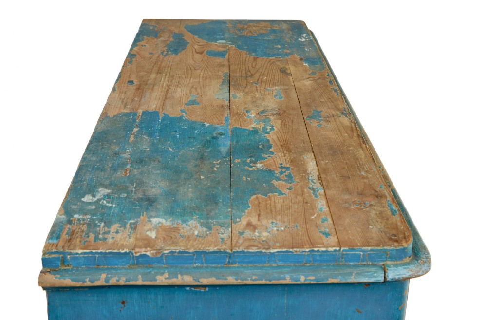 A mid-19th-century Scandinavian pine cupboard featuring distressed blue paint, two panelled doors with painted floral motifs, and short block feet. View XI
