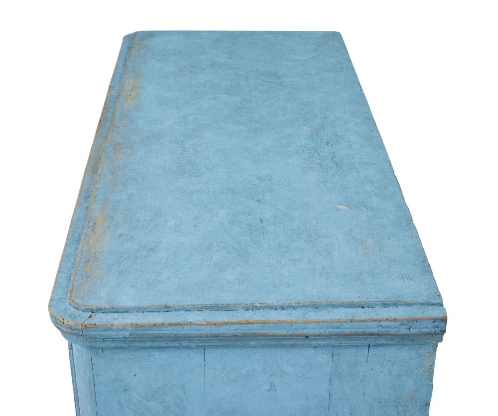 A 19th-century Swedish pine cupboard featuring a painted light blue distressed finish, double panelled doors, and top iron latch. View II
