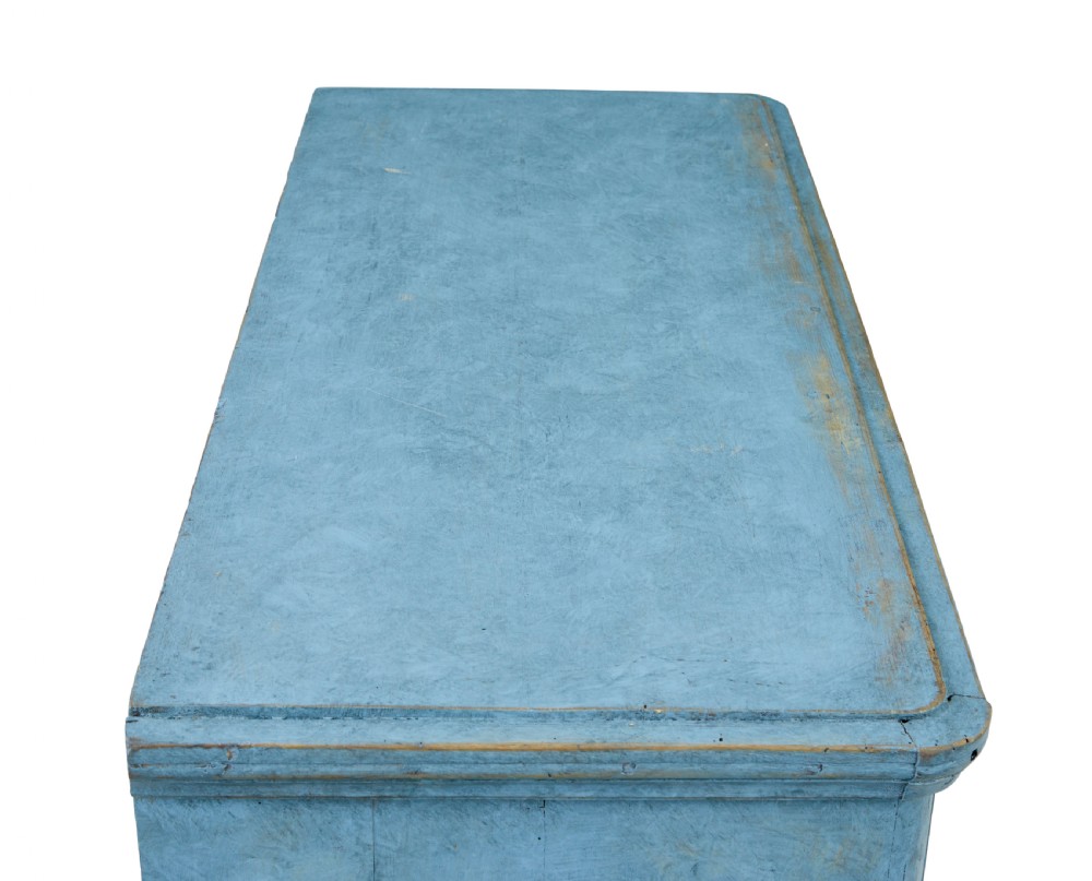 A 19th-century Swedish pine cupboard featuring a painted light blue distressed finish, double panelled doors, and top iron latch. View III