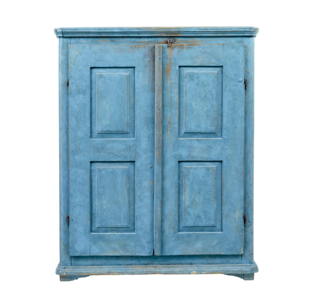 A 19th-century Swedish pine cupboard featuring a painted light blue distressed finish, double panelled doors, and top iron latch. View V