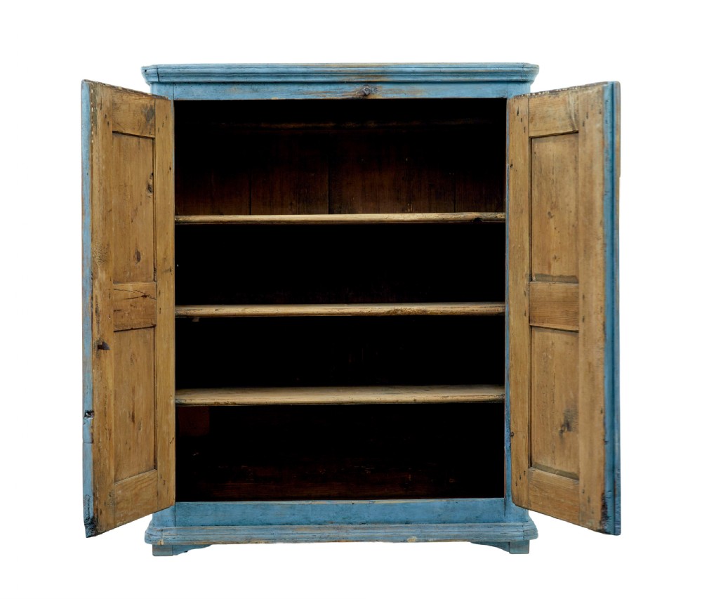 A 19th-century Swedish pine cupboard featuring a painted light blue distressed finish, double panelled doors, and top iron latch. View VI