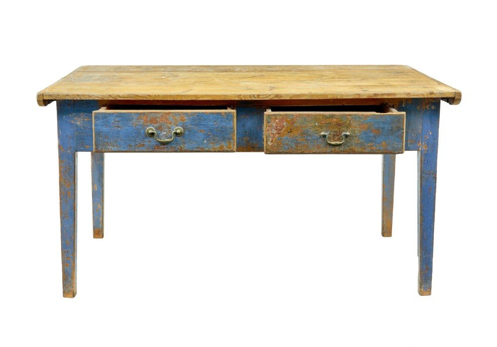 A 19th-century Scandinavian bakers table featuring a distressed blue painted base, two front drawers with brass drop handles, and an unpainted pine top with raised side lips. View IV