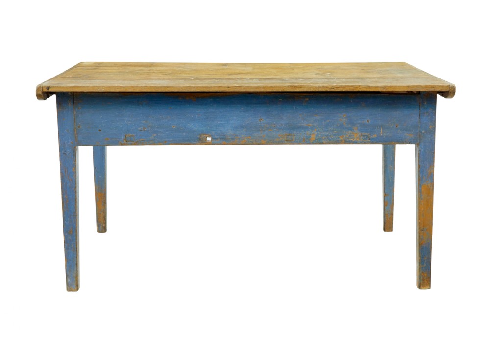 A 19th-century Scandinavian bakers table featuring a distressed blue painted base, two front drawers with brass drop handles, and an unpainted pine top with raised side lips. View VI
