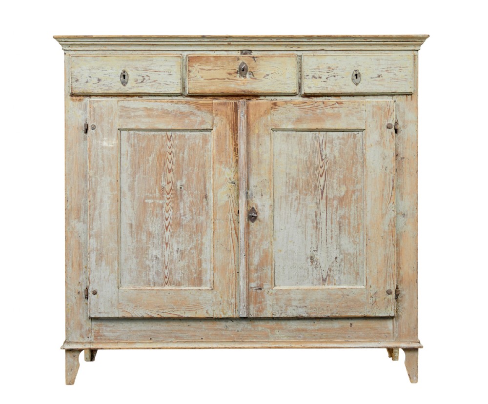 A nineteenth-century Swedish pine cabinet featuring a scraped pale blue painted finish, three top drawers, two panelled cupboard doors, and iron escutcheons. View III