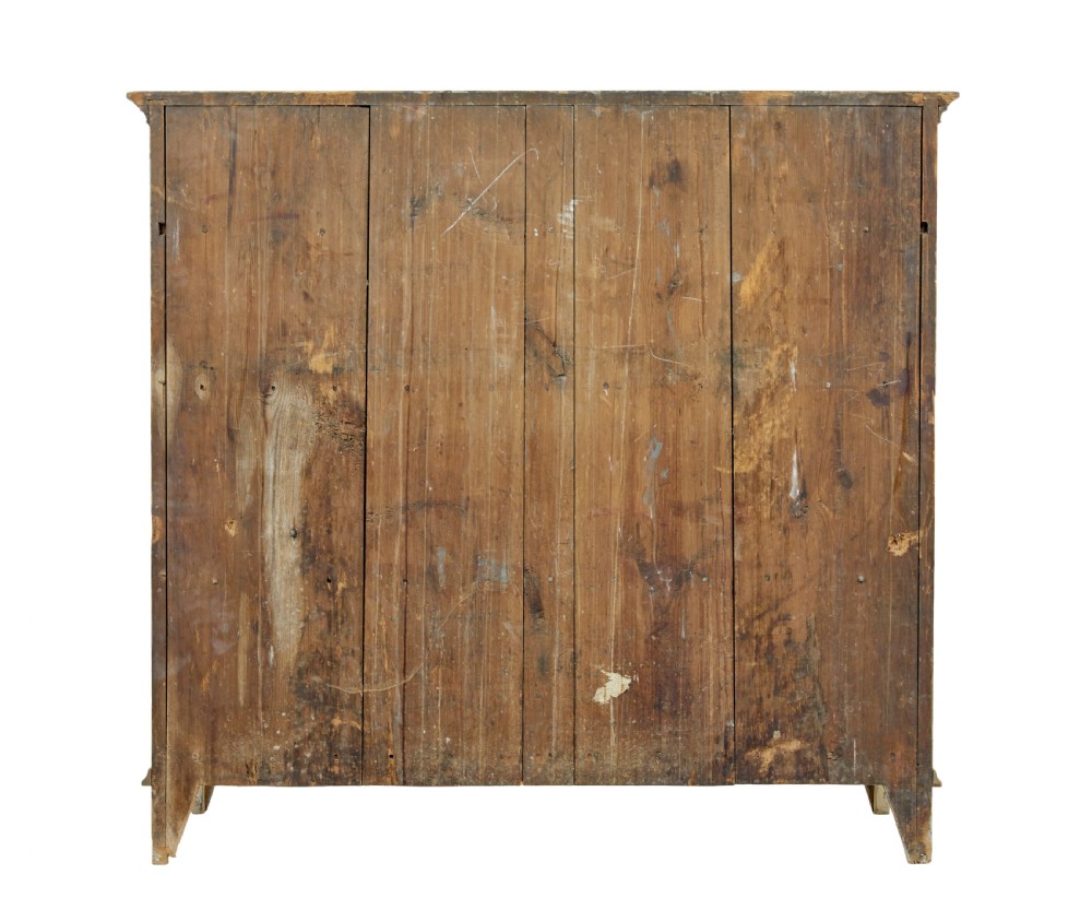 A nineteenth-century Swedish pine cabinet featuring a scraped pale blue painted finish, three top drawers, two panelled cupboard doors, and iron escutcheons. View VI