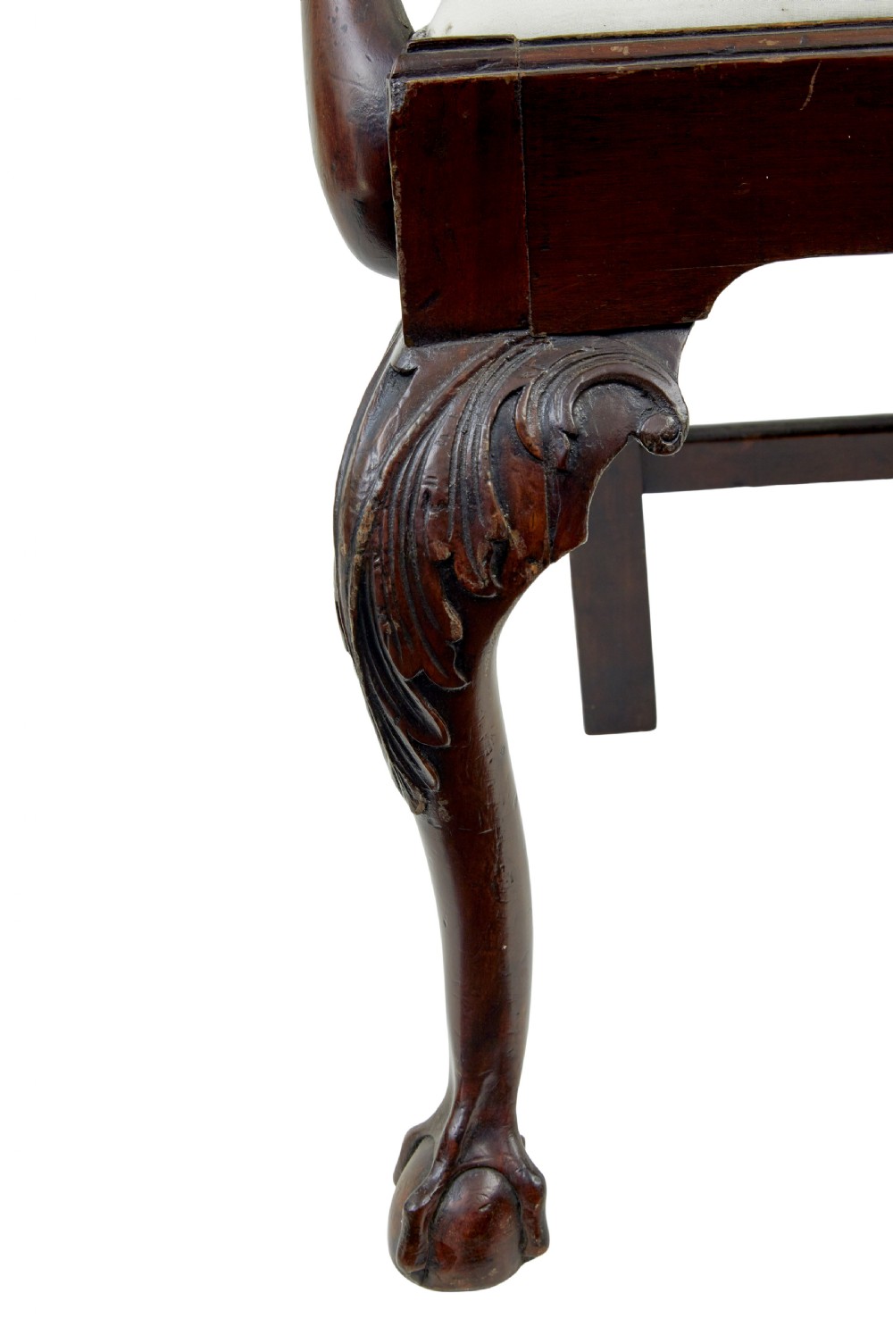 A set of mahogany Chippendale style dining chairs featuring carved back splats, cabriole legs ending in ball and claw feet, and light-coloured upholstered drop-in seats. View IX