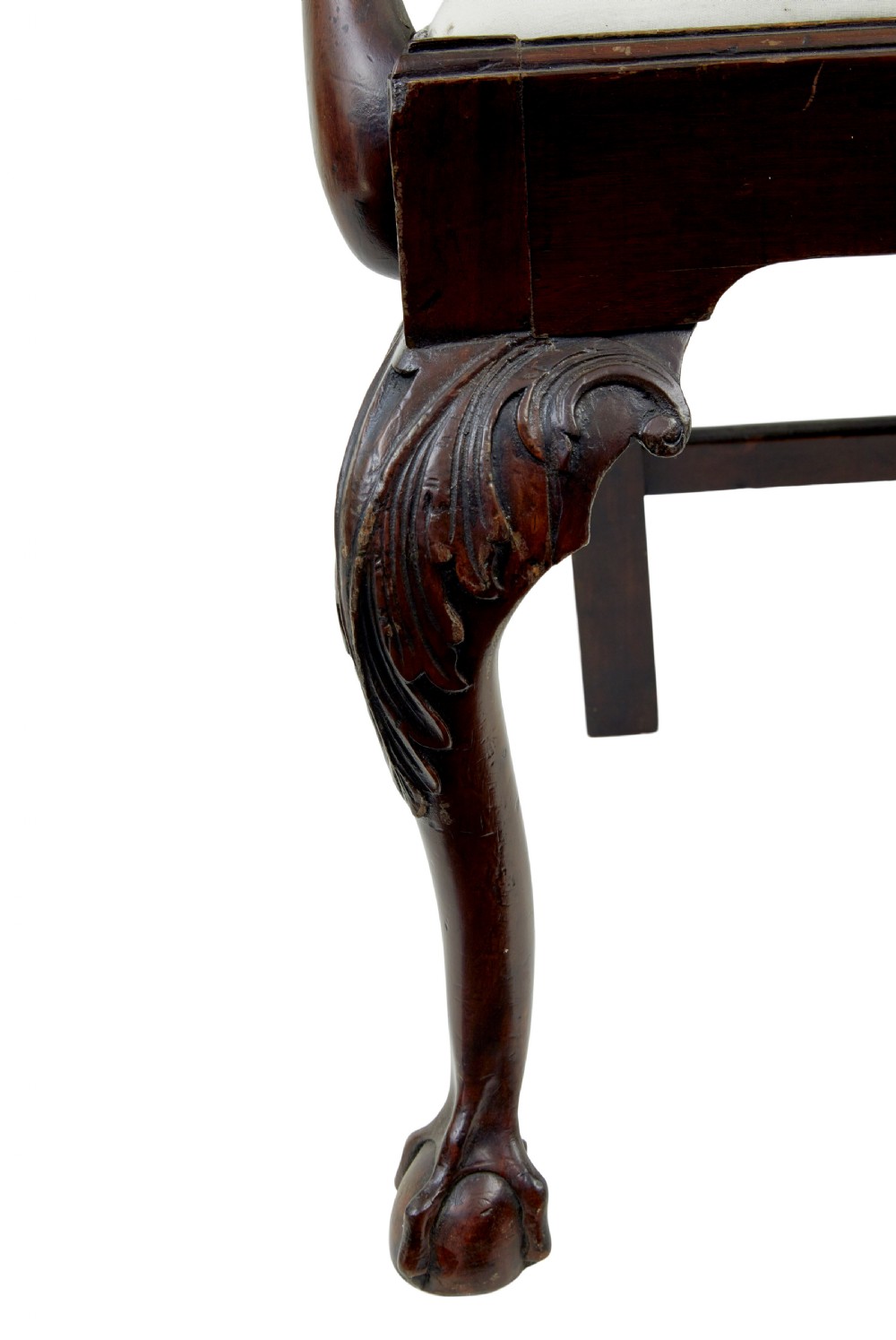 A set of mahogany Chippendale style dining chairs featuring carved back splats, cabriole legs ending in ball and claw feet, and light-coloured upholstered drop-in seats. View X