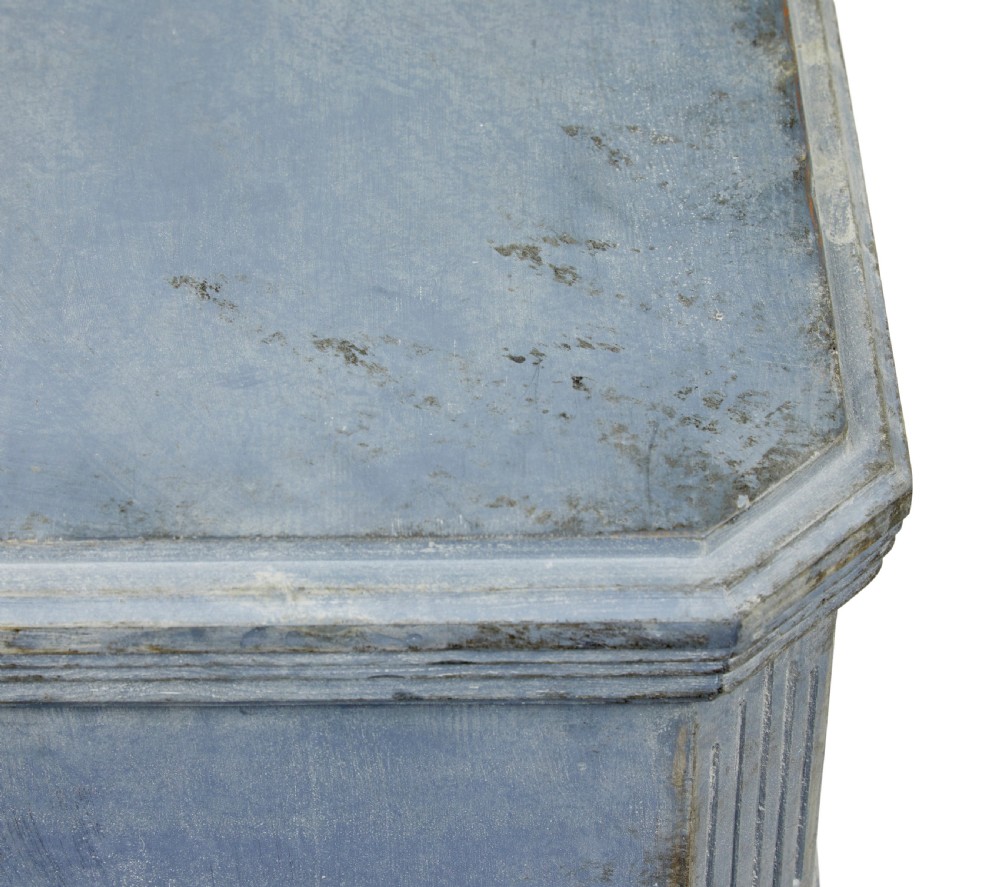 A pair of 19th-century Swedish Gustavian influenced three-drawer chests of drawers with a muted grey-blue painted finish and brass ring handles. View X