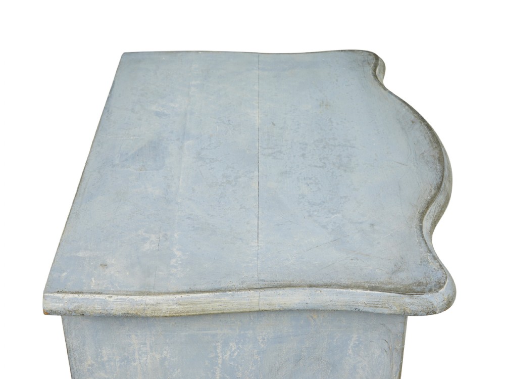 A pair of 19th-century Swedish three-drawer commodes featuring distressed pale blue painted finishes, cabriole legs, and brass hardware. View III