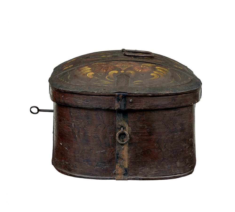 An oval dark brown 19th-century wooden box featuring hand-painted yellow and red floral folk motifs with iron bands and a latch. View III