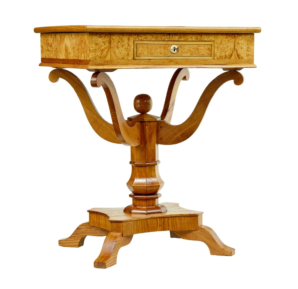 A 19th-century Scandinavian occasional table made of burr birch and elm with a single drawer, S-curved supports, a turned central pedestal, and a four-footed base. View II