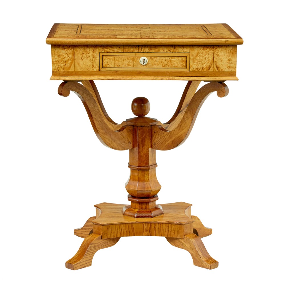 A 19th-century Scandinavian occasional table made of burr birch and elm with a single drawer, S-curved supports, a turned central pedestal, and a four-footed base. View III
