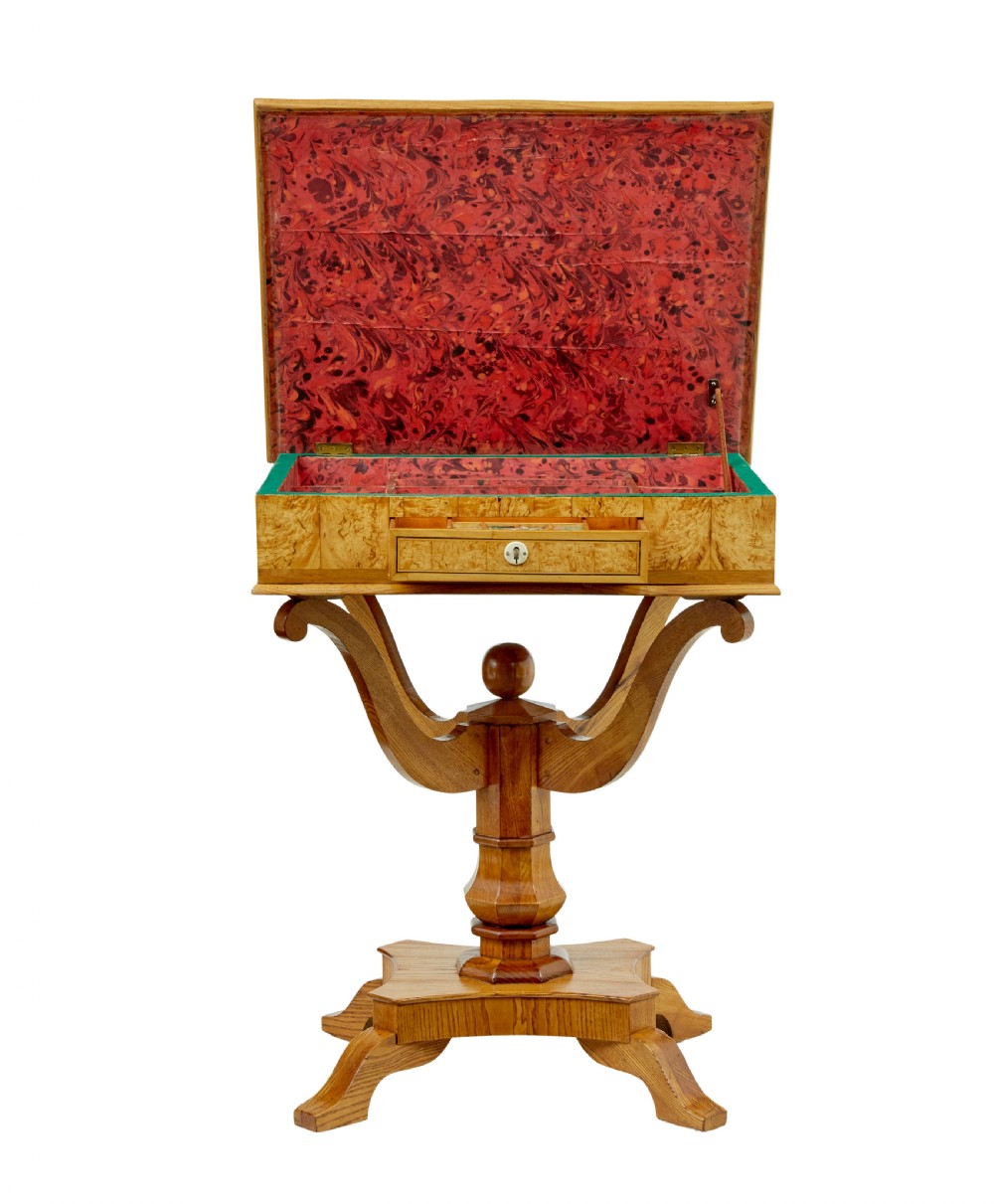 A 19th-century Scandinavian occasional table made of burr birch and elm with a single drawer, S-curved supports, a turned central pedestal, and a four-footed base. View IV