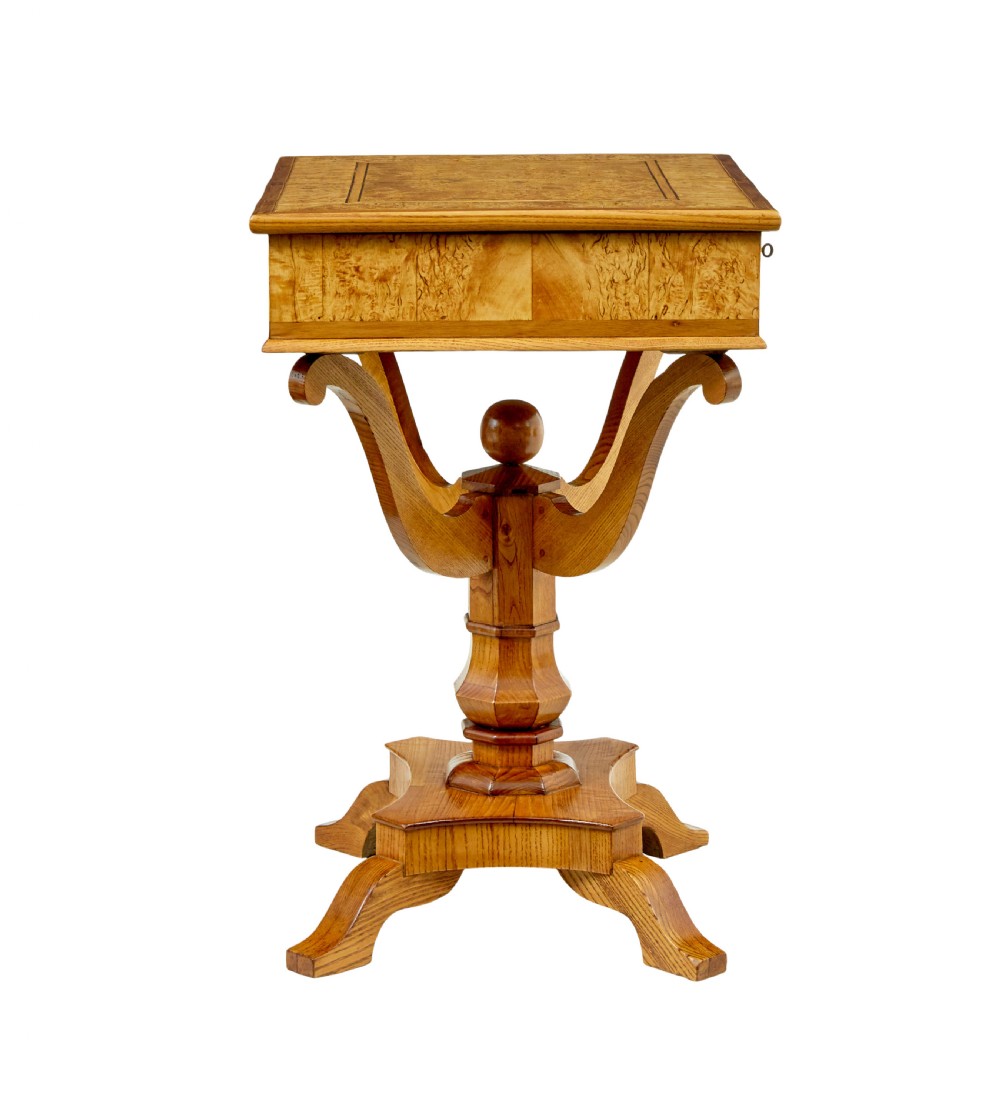A 19th-century Scandinavian occasional table made of burr birch and elm with a single drawer, S-curved supports, a turned central pedestal, and a four-footed base. View VII