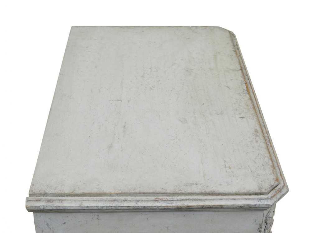 A pair of nineteenth-century Swedish Gustavian grey painted chests of drawers featuring Greek key frieze carving, fluted corners, and brass ring pulls. View VIII