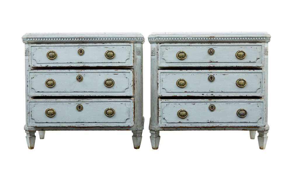 A pair of 19th-century pale blue-grey painted chests of drawers with three drawers each, brass ring handles, fluted corners, and faux marble tops. View II