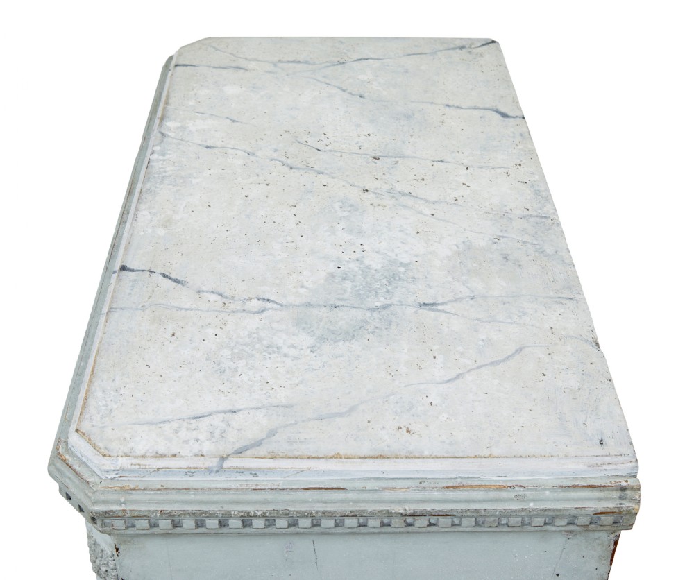 A pair of 19th-century pale blue-grey painted chests of drawers with three drawers each, brass ring handles, fluted corners, and faux marble tops. View X