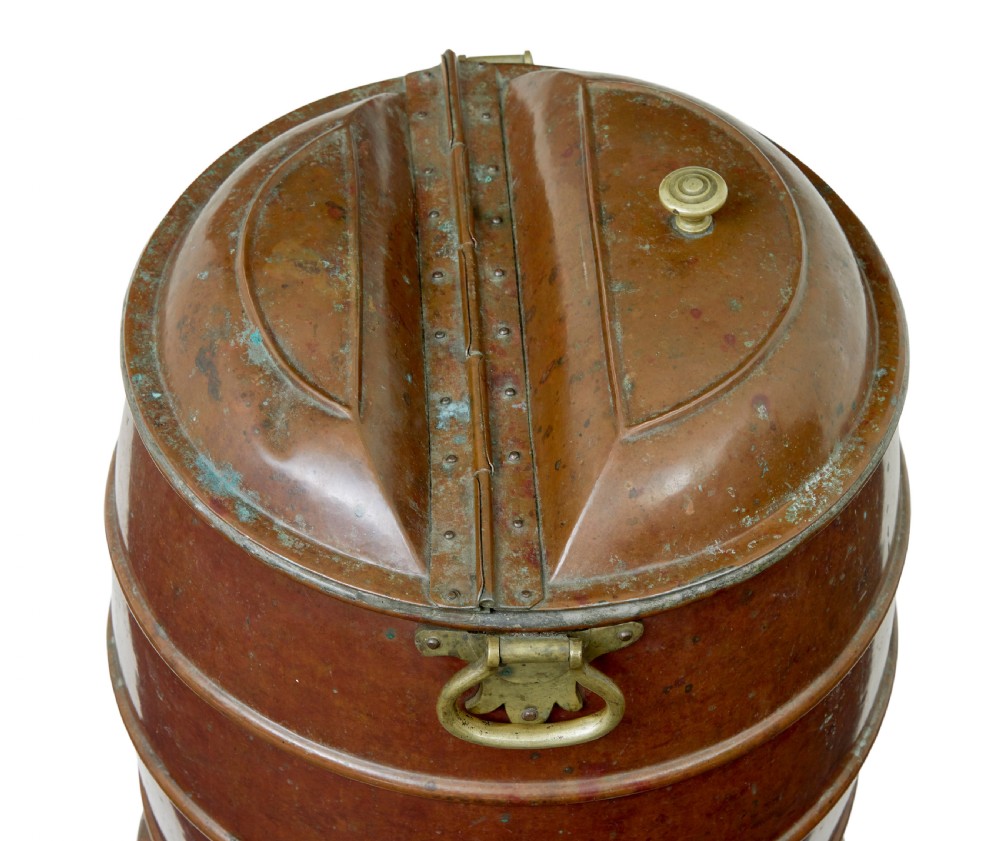 A nineteenth-century barrel-shaped copper water container with horizontal bands, brass handles, and a fitted lid. View VII