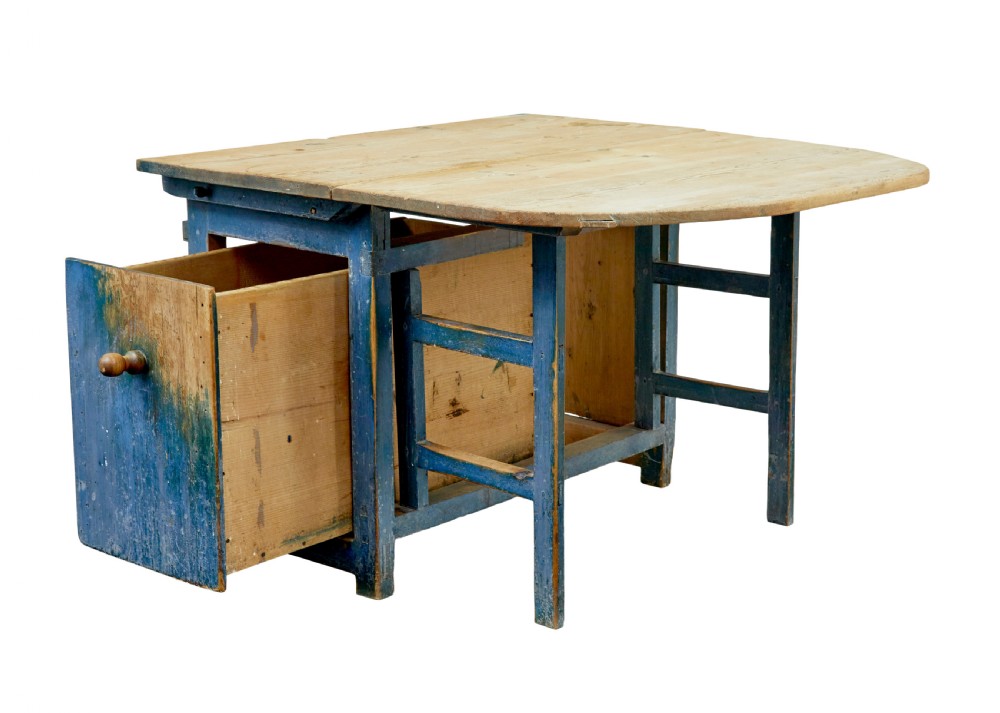 A 19th-century Swedish pine drop-leaf table featuring a raw timber top and a distressed blue painted base with a hinged leaf mechanism. View II