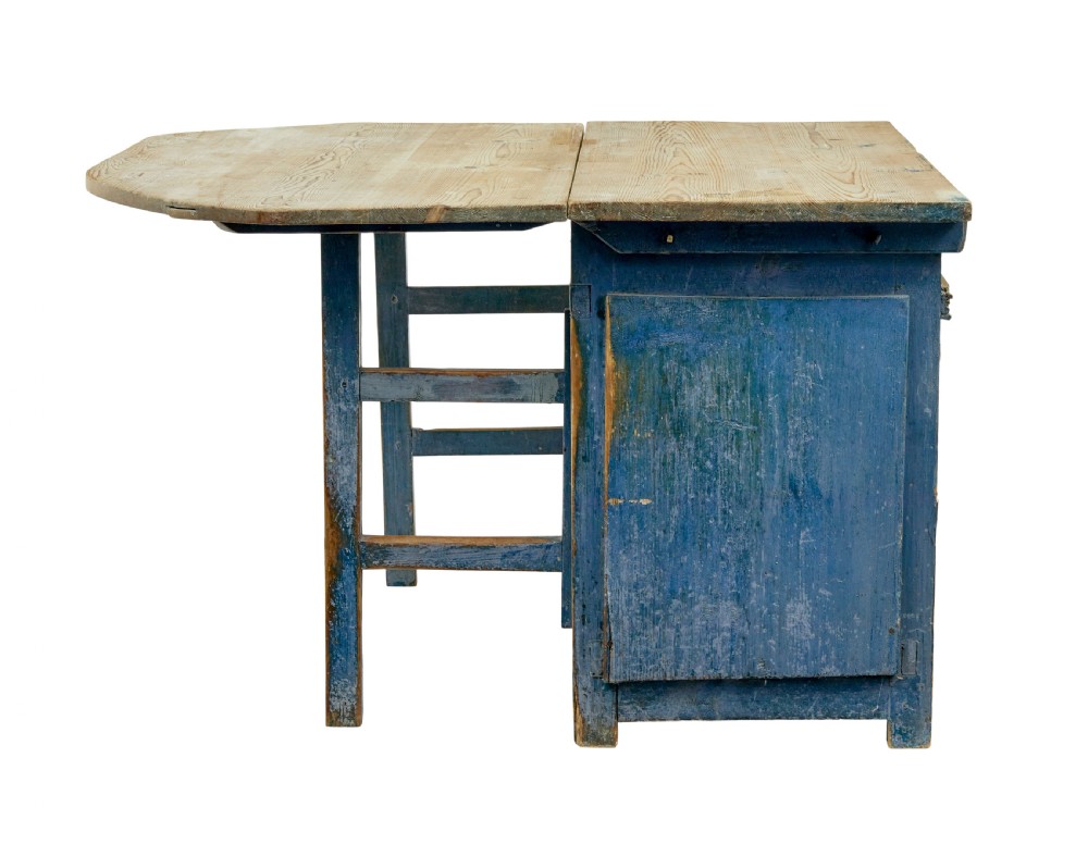 A 19th-century Swedish pine drop-leaf table featuring a raw timber top and a distressed blue painted base with a hinged leaf mechanism. View V