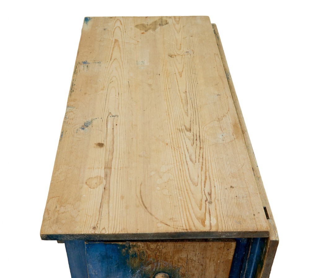 A 19th-century Swedish pine drop-leaf table featuring a raw timber top and a distressed blue painted base with a hinged leaf mechanism. View IX