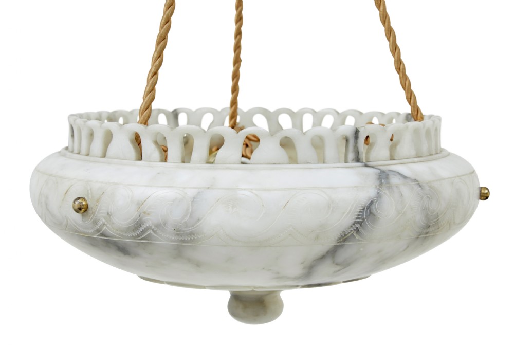 A hand-carved off-white alabaster bowl ceiling light suspended by braided cords with a decorative tassel and matching top rose. View III