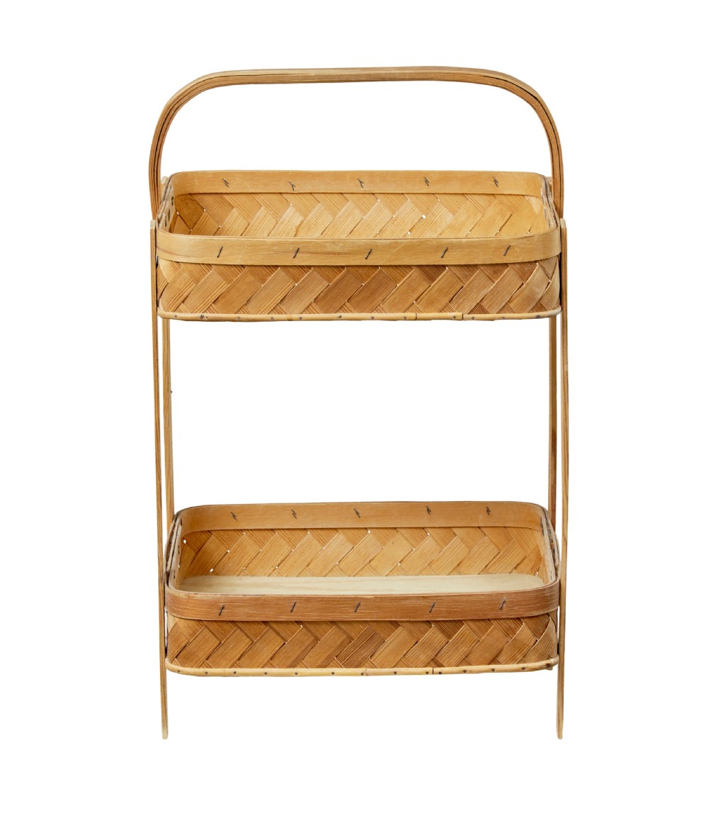 An early twentieth-century two-tier stand constructed from light-coloured woven pine splints with a bentwood arch handle and straight timber legs. View IV