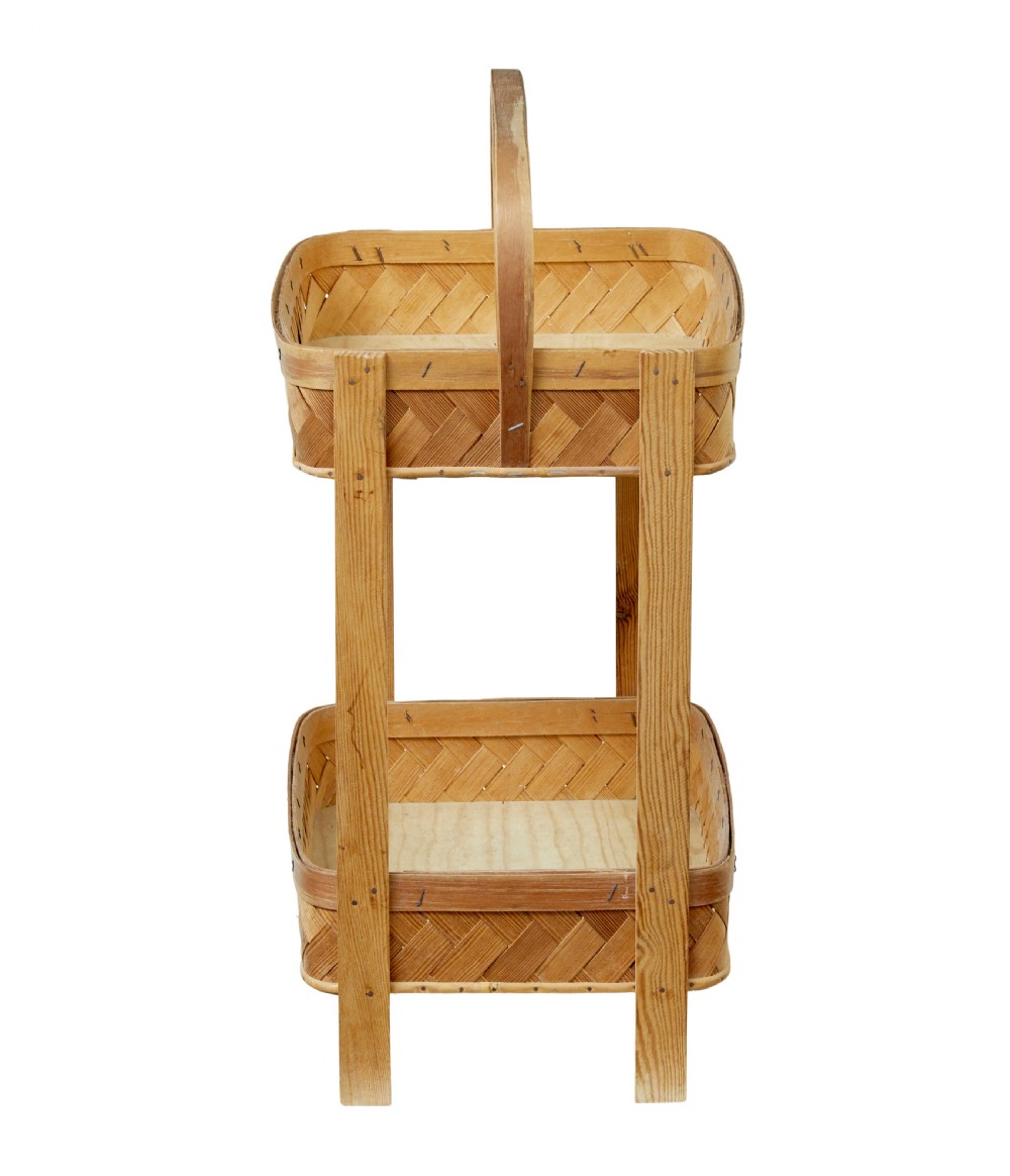 An early twentieth-century two-tier stand constructed from light-coloured woven pine splints with a bentwood arch handle and straight timber legs. View VIII