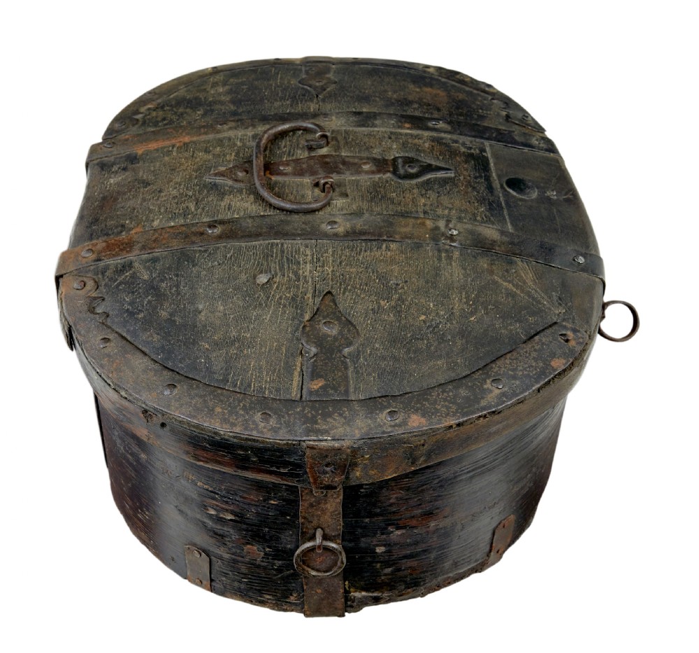 A mid-19th century Swedish oval pine strong box with dark painted finish and iron strapping. View V