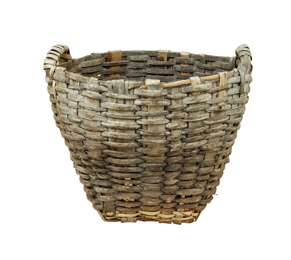 A large, weathered hand-woven basket made from thick grey pine splints with two integrated woven handles at the top rim. View II